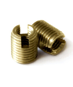 Self tapping insert for plastic